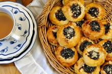 
	Cakes of a handy size, made from yeast dough, filled with curd cheese, with plum jam...