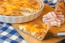 
	The traditional French quiche contains bacon, créme-fraîche and golden fried...